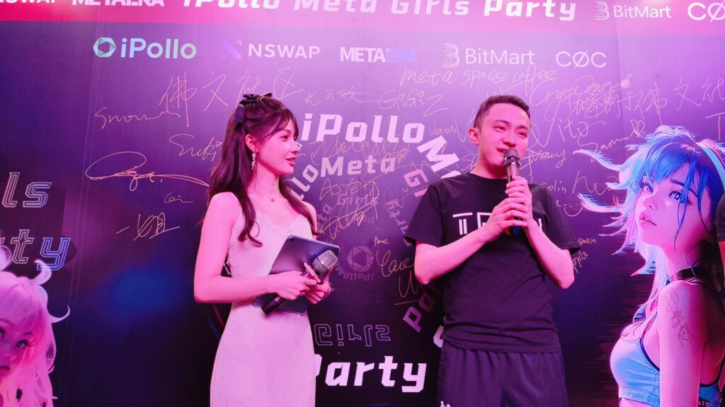 Justin Sun blushes as he shares a stage with Nina on Apr. 11, oblivious to the looming legal threat that will materialize the day after. 